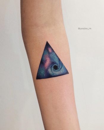Miniature triangle space tattoo