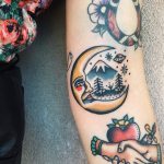 Moon and landscape tattoo