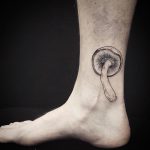 Mushroom tattoo on the ankle