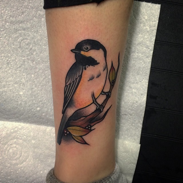 Neo traditional style tit tattoo
