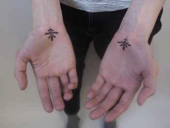 Ornament tattoos on palms
