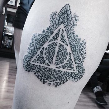 Ornamental deathly hallows tattoo