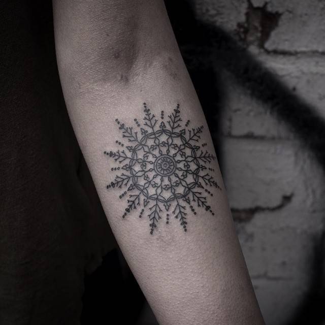 Ornamental snowflake tattoo by alex bawn