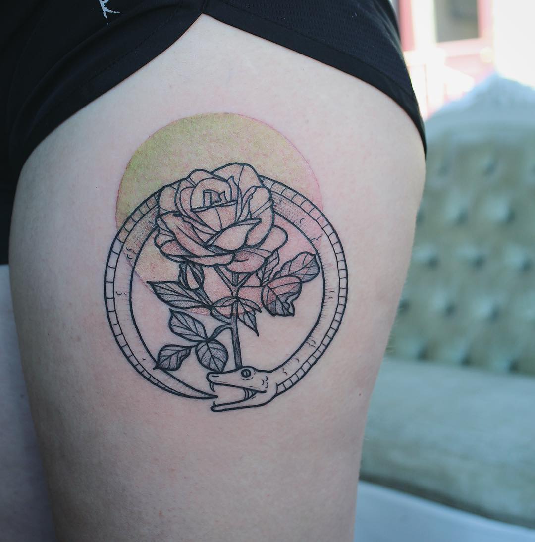Ouroboros and rose tattoo