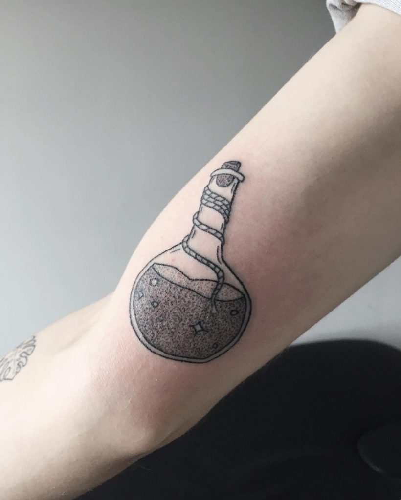 Potion bottle tattoo