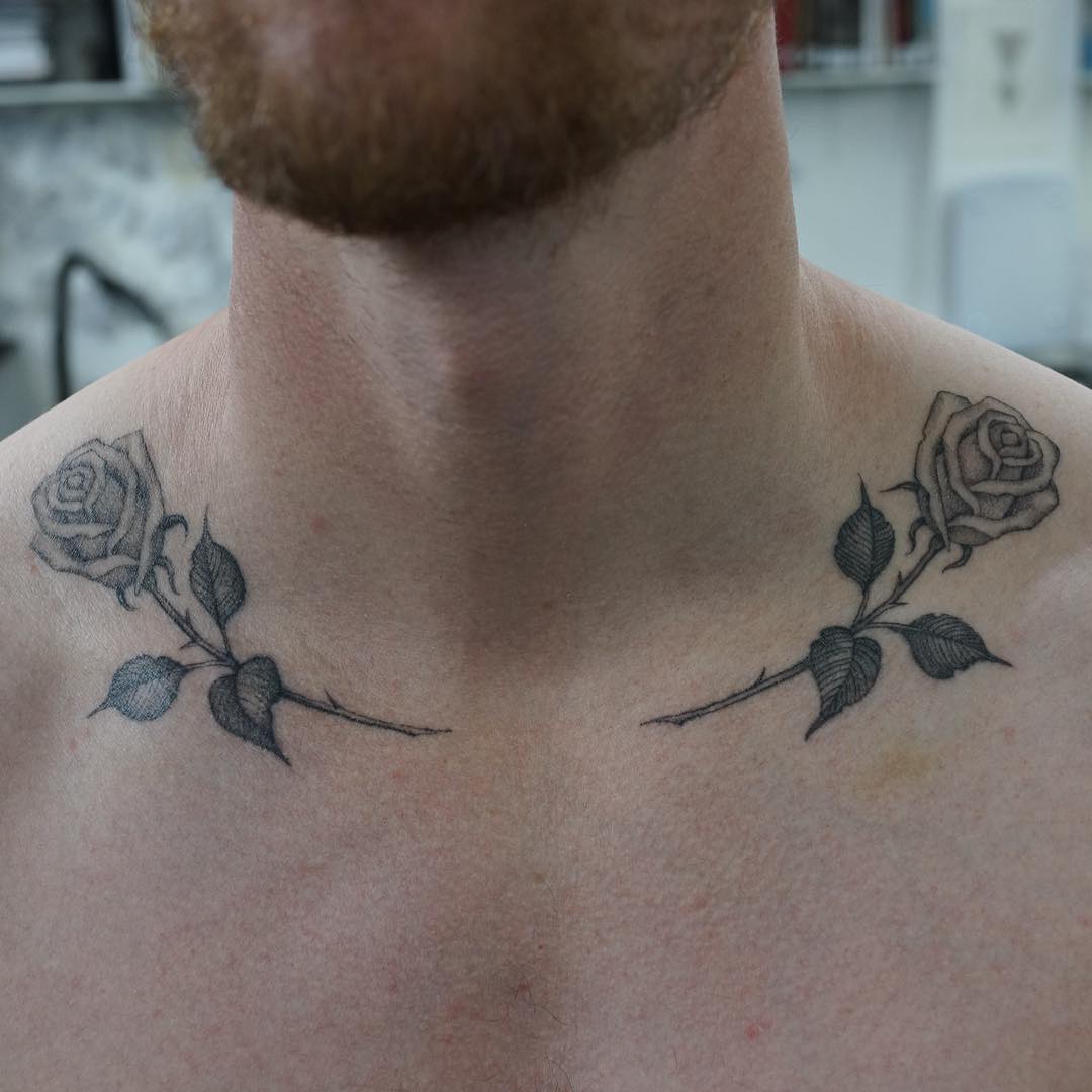 Rose tattoos on clavicle bone