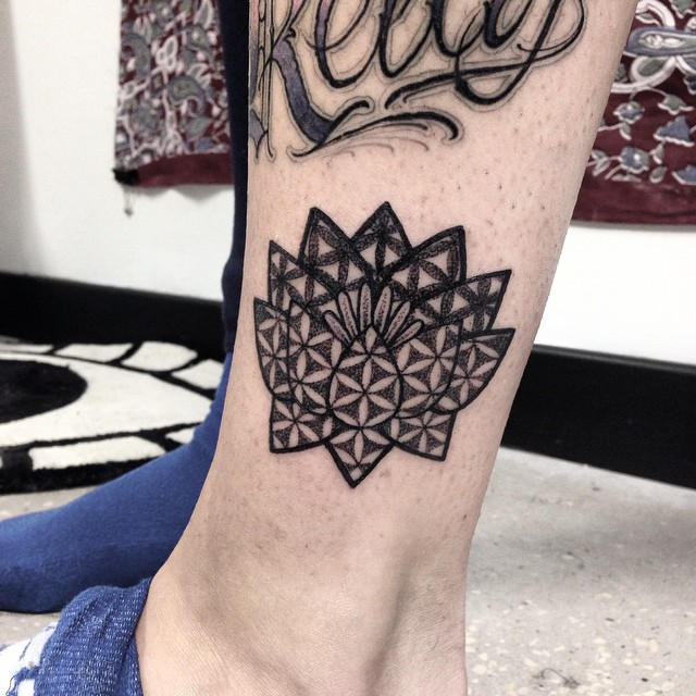 Sacred geometry lotus flower tattoo