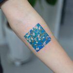 Sakura's bloom and blue sky tattoo