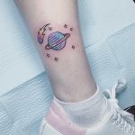 Saturn and stars tattoo