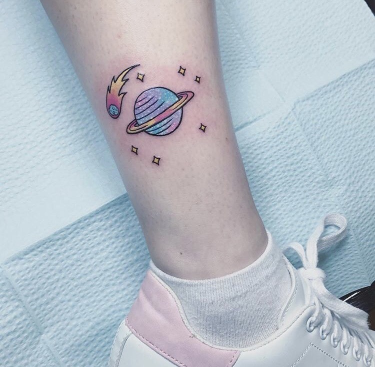 Saturn and stars tattoo