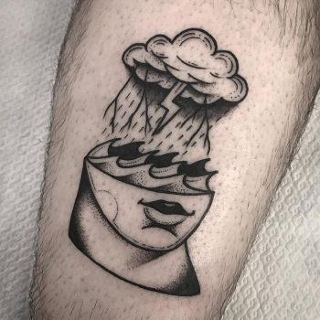 Sea face tattoo