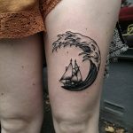 Ship and wave tattoo