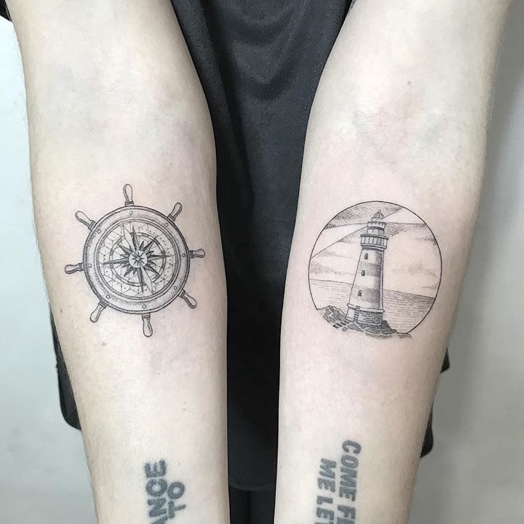 Ship wheel and lighthouse tattoos