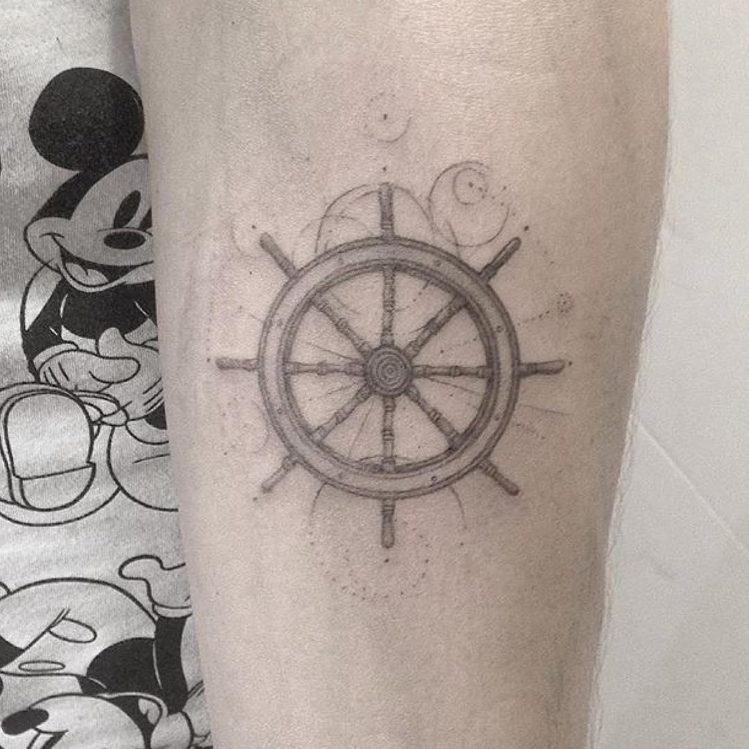 Ship wheel tattoo by lindsay april