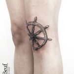 Ship wheel tattoo by loïc lebeuf
