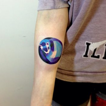 Sleeping ferret tattoo