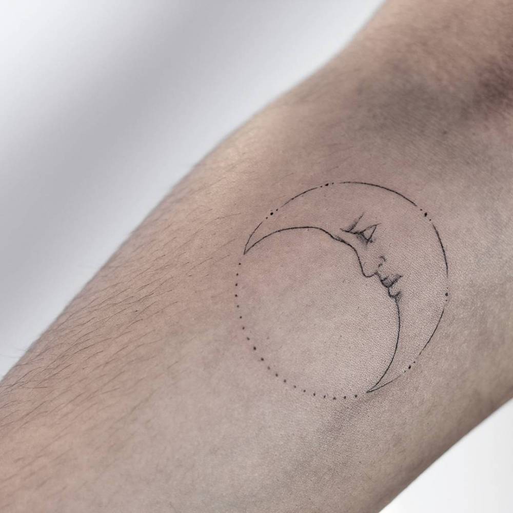 Sleeping moon tattoo