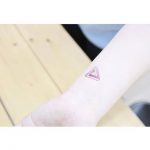Small penrose triangle tattoo