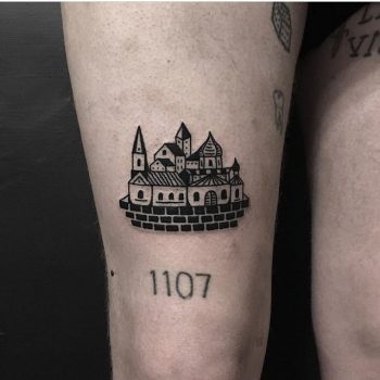 Small blackwork town tattoo