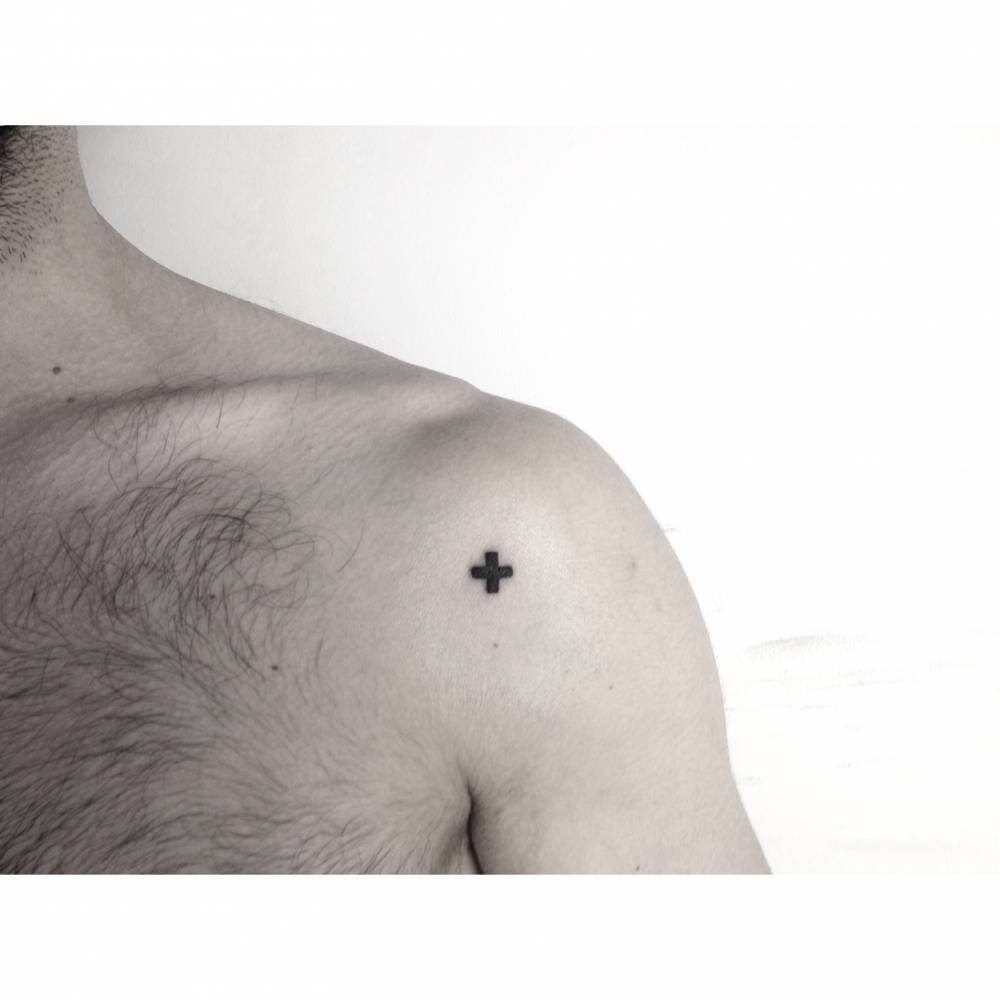 Small cross tattoo by alican görgü