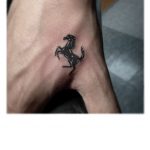 Small horse tattoo on the hand