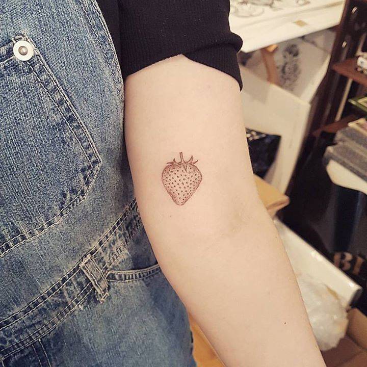 Small strawberry tattoo by sarah march