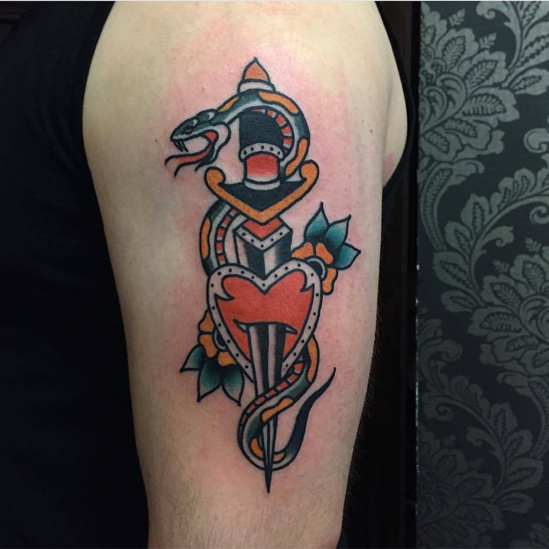 Snake and dagger tattoo by kelly smith 
