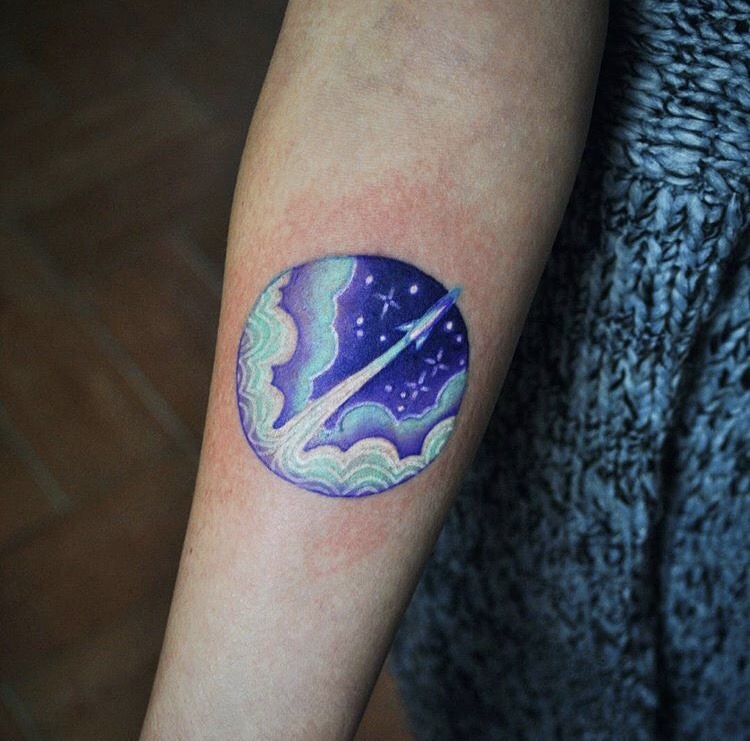 Space rocket tattoo