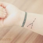 Taurus constellation tattoo on the inner wrist