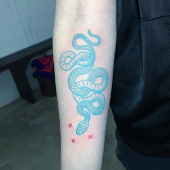 Teal snake and red stars tattoo
