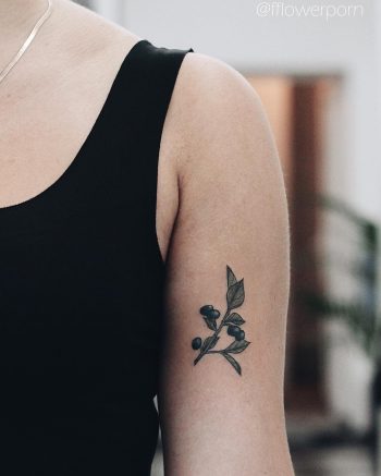 Tiny blueberry tattoo