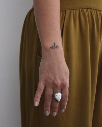 Tiny lotus flower on the wrist