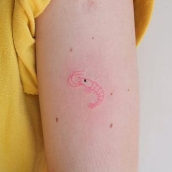 Tiny pink shrimp tattoo
