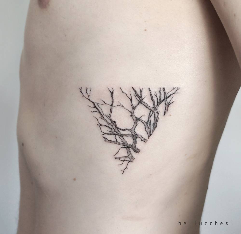 tree branch tattoo chest