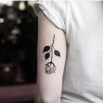 Upside down rose tattoo by jonas