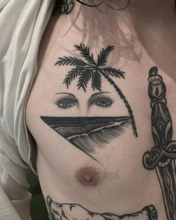 Waves, palm tree and eyes tattoo