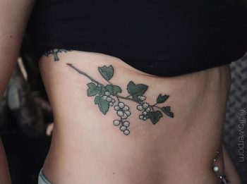 White currant tattoo on the right rib