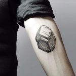 Woodcut coal tattoo