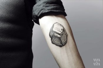 Woodcut coal tattoo
