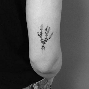Hand poked thyme tattoo