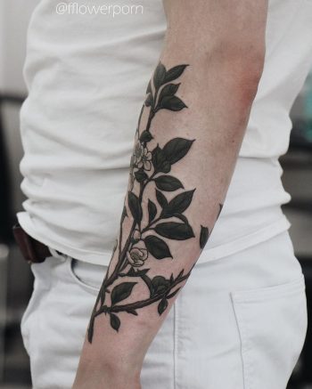 Apple branch in bloom tattoo
