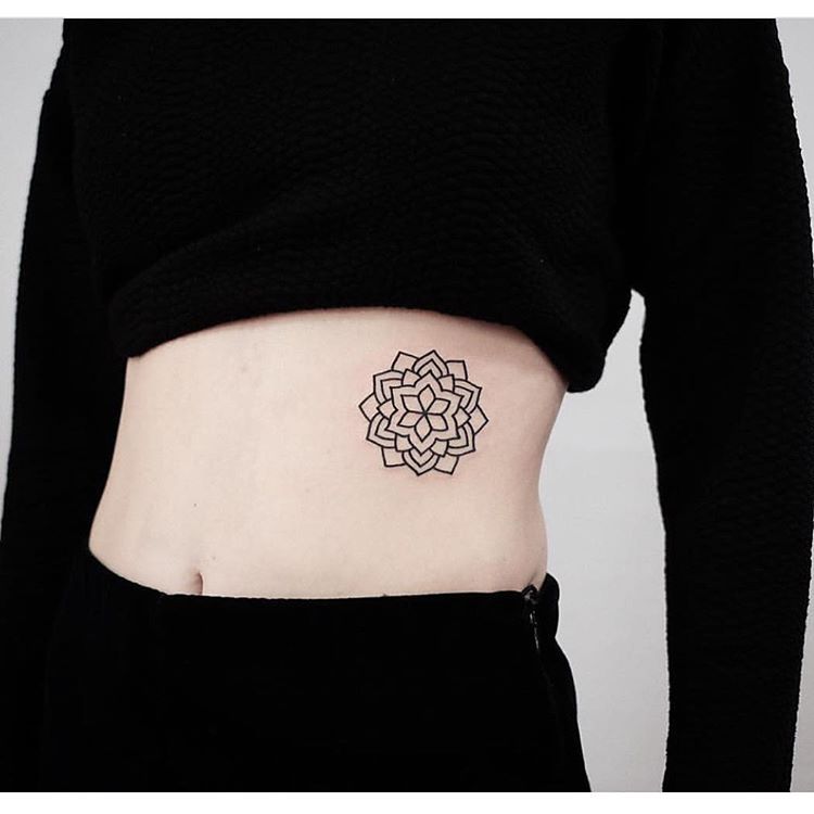 Black floral mandala tattoo by jonas ribeiro