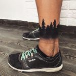 Black forest tattoo on the left ankle