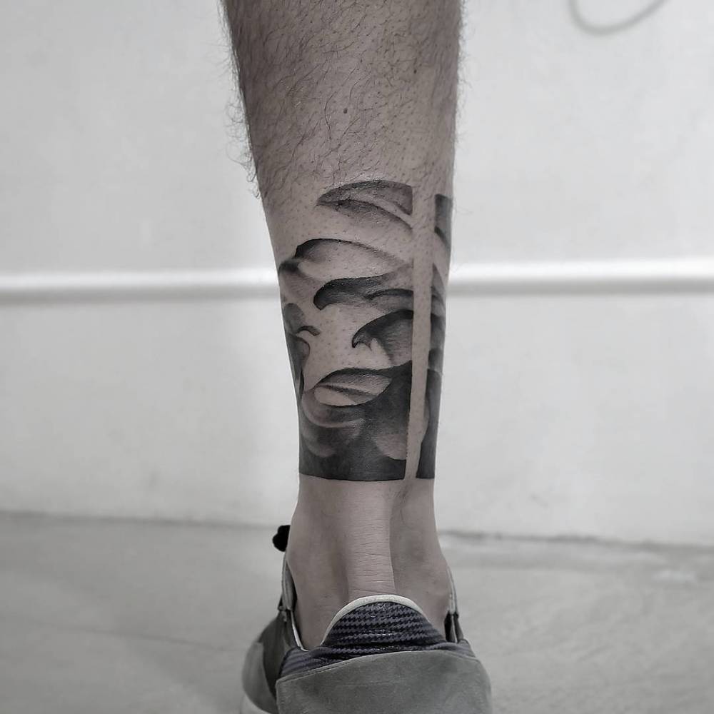 Black gradient waves tattoo