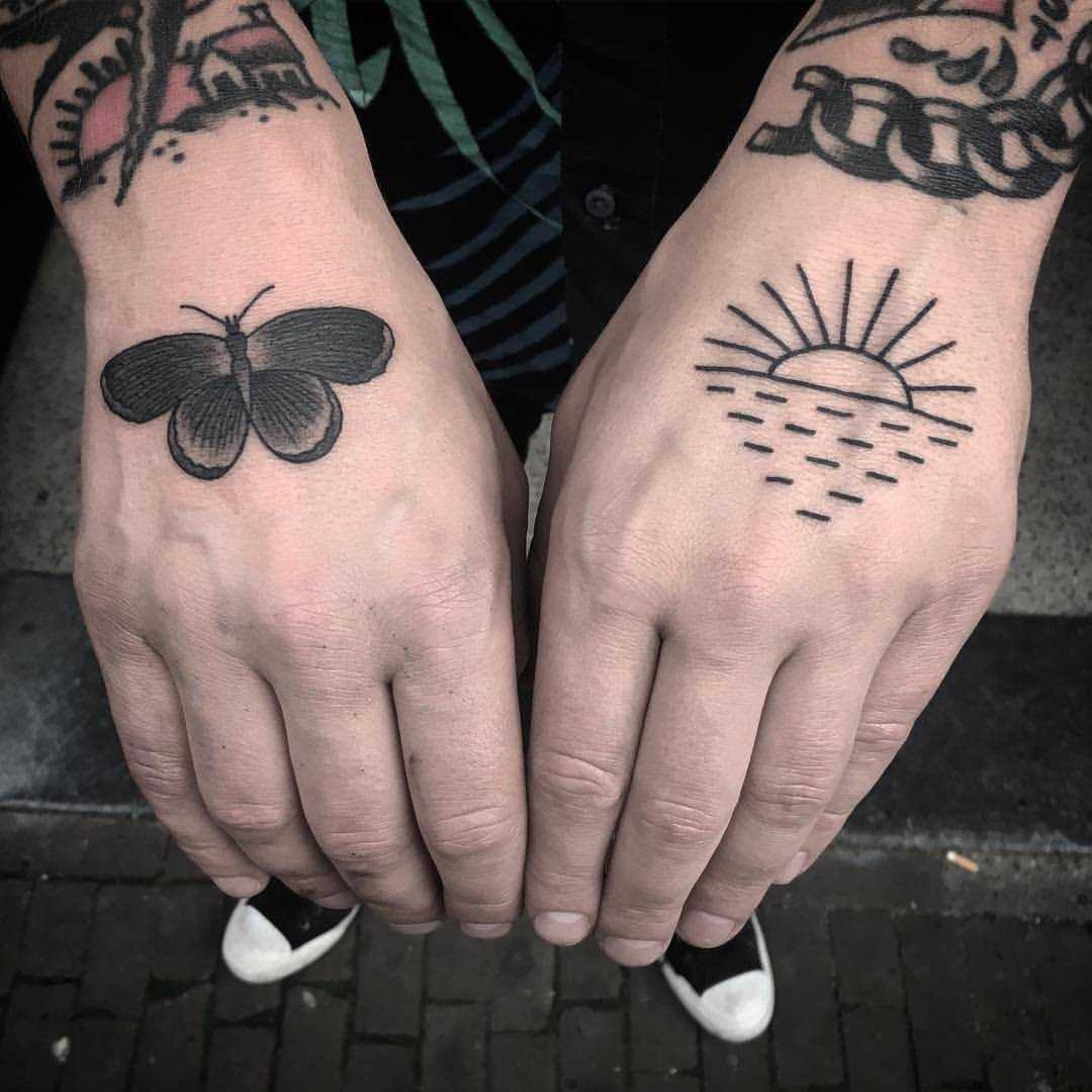 Butterfly and sunset tattoo