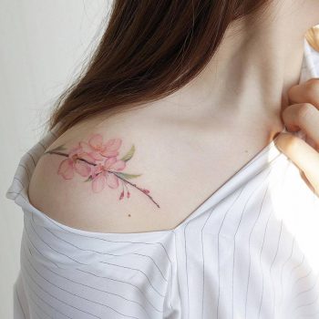 Cherry blossoms tattoo on the shoulder