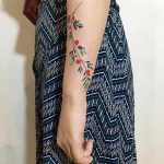 Colorful plant tattoo by tattooist zihee