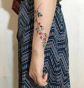 Colorful plant tattoo by tattooist zihee