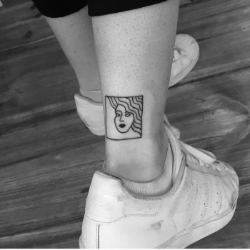 Cool face tattoo by daisy does tattoos