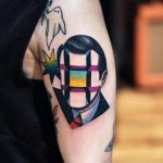 Cubes face tattoo by david côté